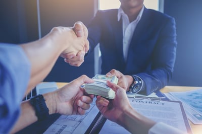 ART_Businessman signs contract, handshake and exchange money 