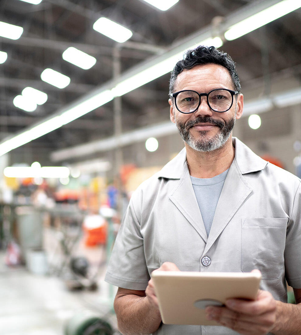 male-industrial-worker-tablet-smiling-portrait