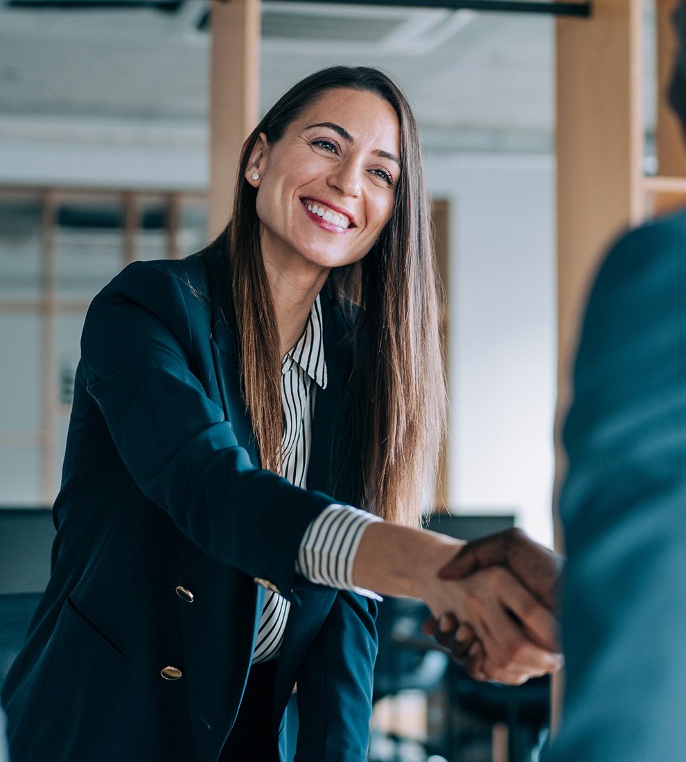 woman-shaking-hand-of-client