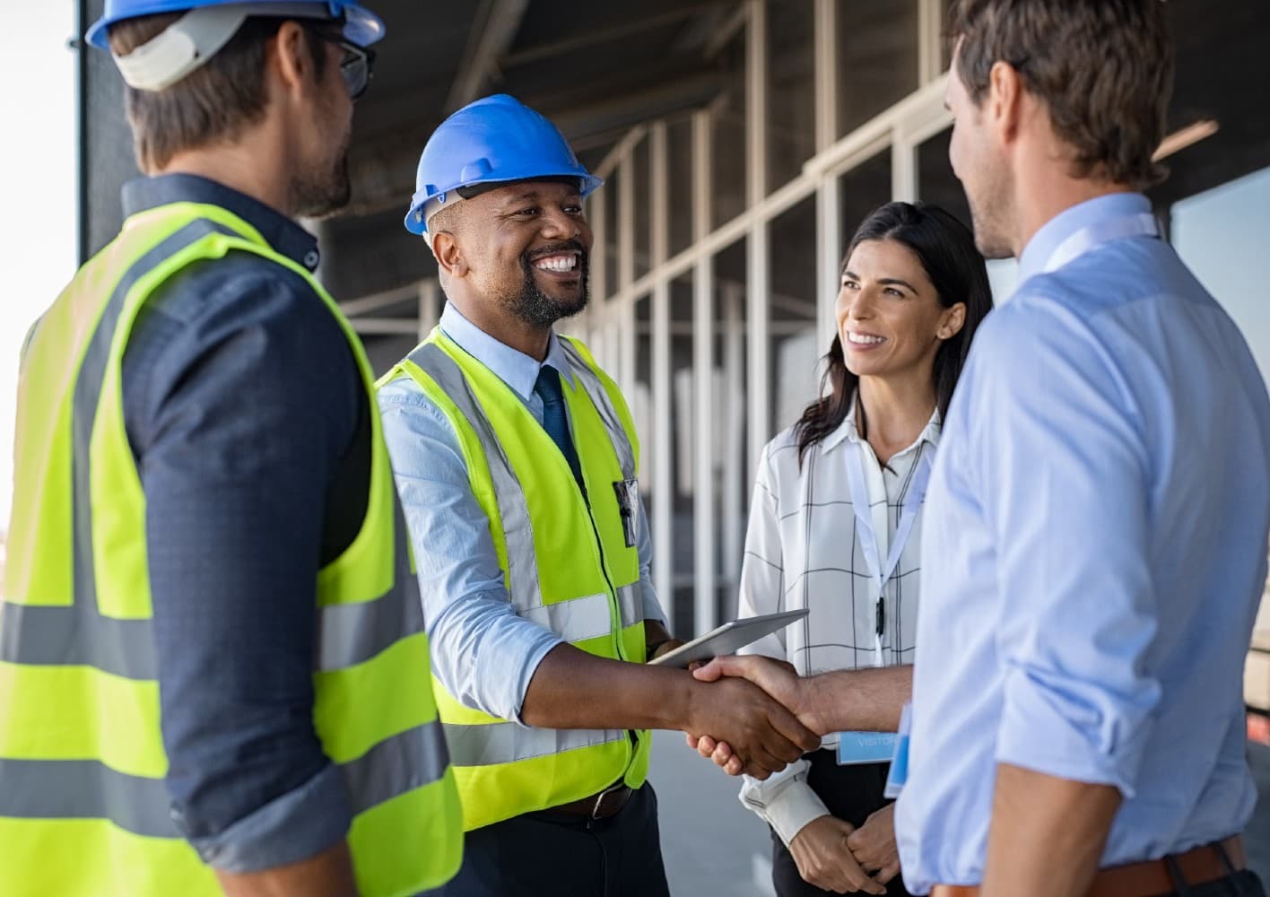 construction worker shaking hands