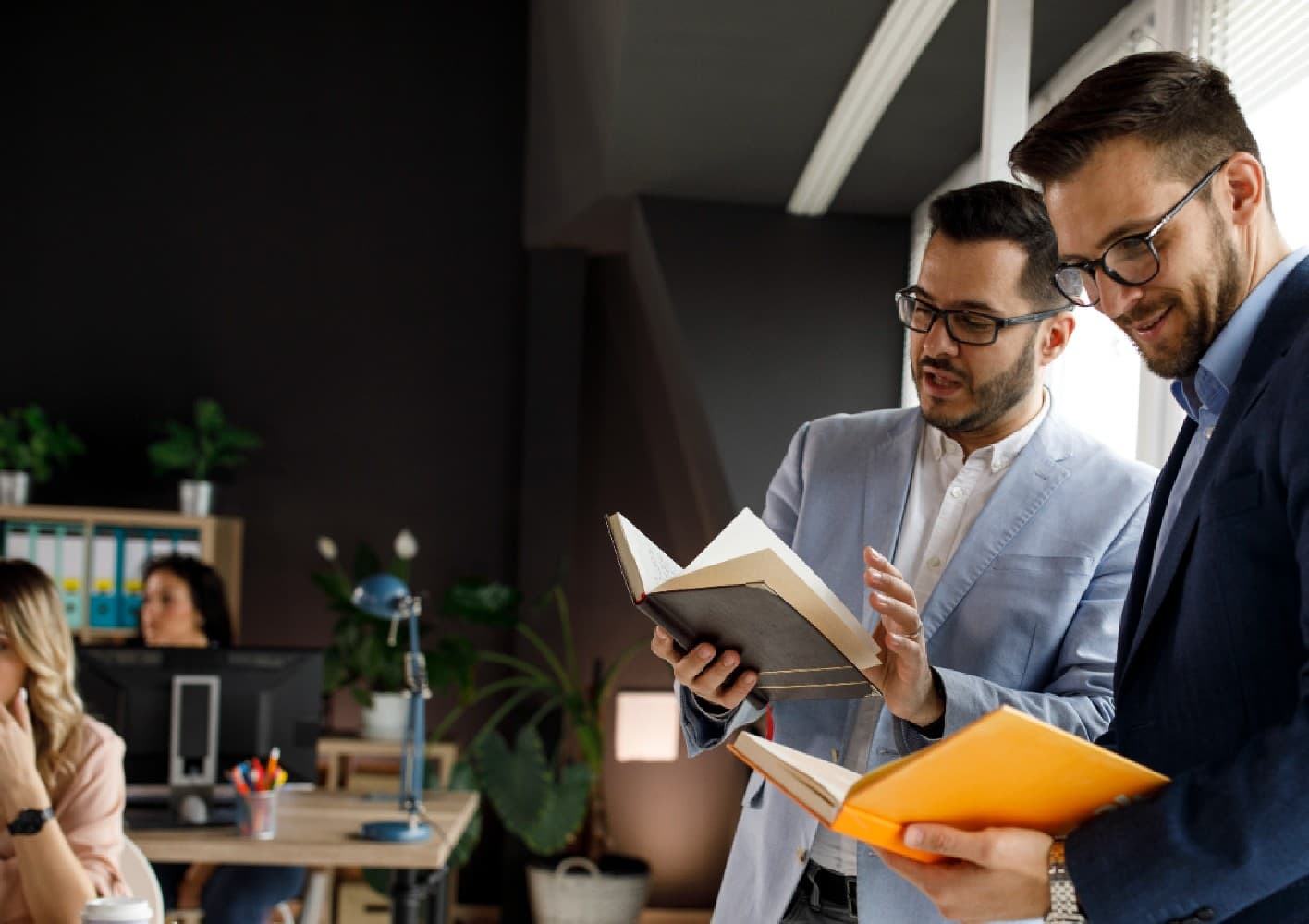 two-men-looking-at-books