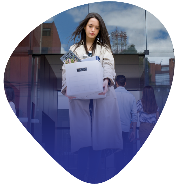 woman-leaving-office-building-with-box