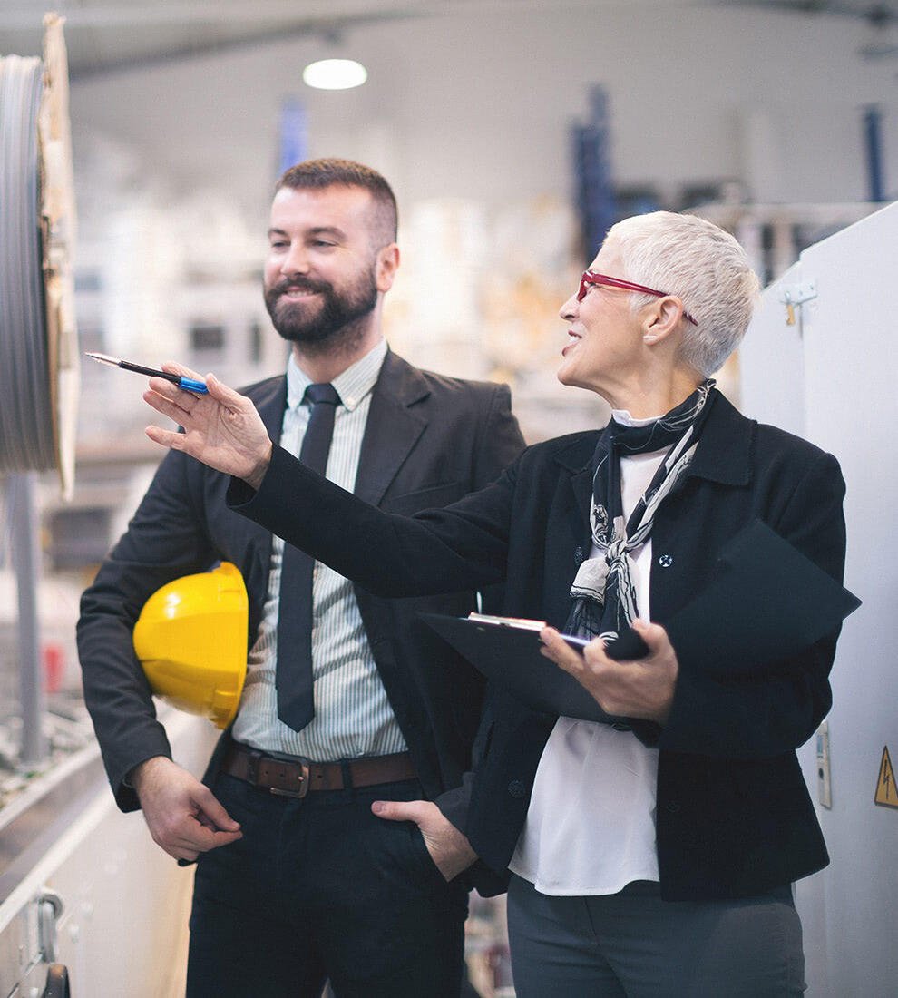 engineers-inspecting-production-line-factory